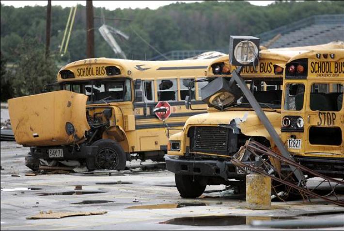 Eight school buses were overturned and destroyed by the tornado.