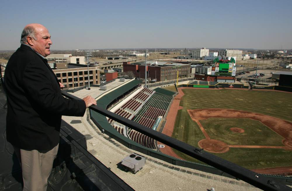 Sandy Mendelson is shown looking out at Fifth Third Field in 2007, the year he announced he planned to retire. The announcement was "a mistake," he says now. Dayton Daily News archive photo